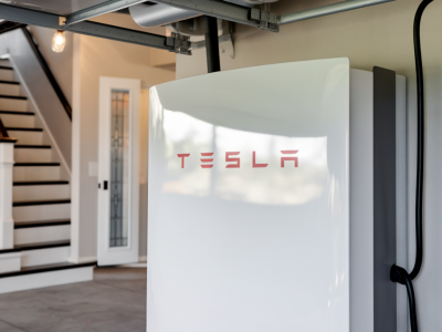 Can tesla powerwall owners legally export stored power to the grid and earn money in the uk